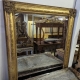 Grand miroir Napoléon III en bois doré