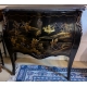 Commode laque noir décor chinois.