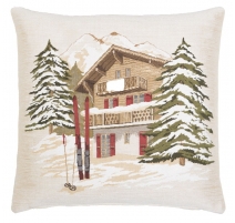 Coussin "Chalet en hiver avec skis"