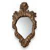 Miroir en bois sculpté doré