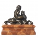 Bronze "Putto assis sur un lion"