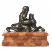 Bronze "Putto assis sur un lion"