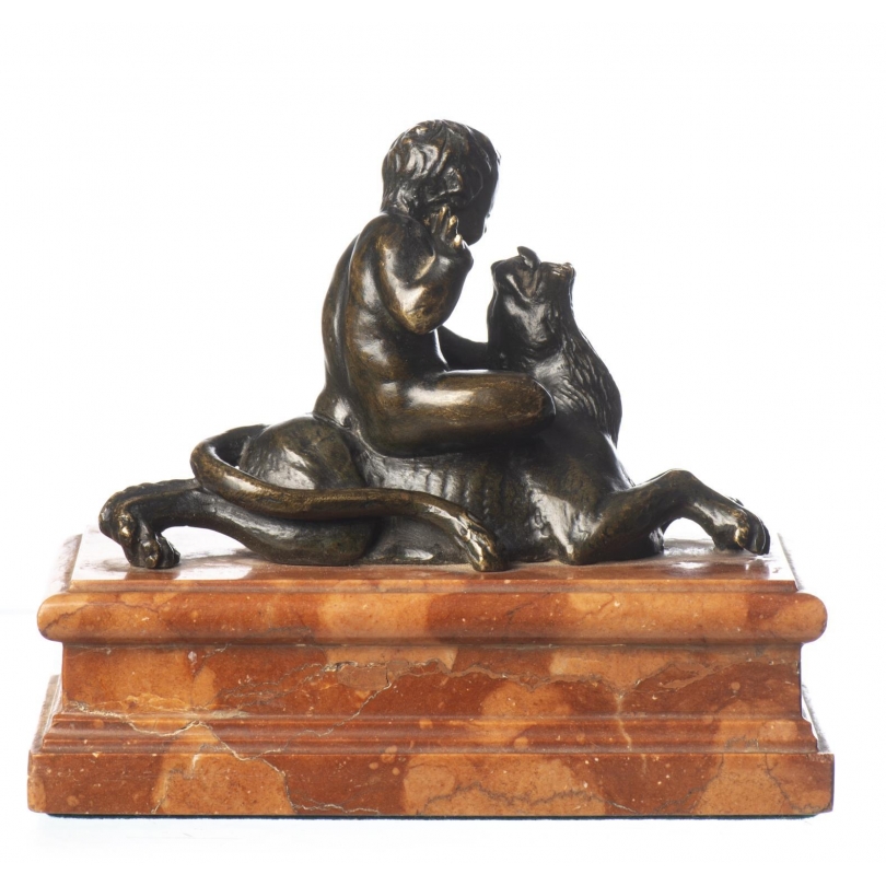 Bronze "Putto assis sur un lion"