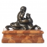 Bronze "Putto assis sur un lion"