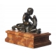 Bronze "Putto assis sur un lion"