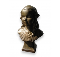 Bronze "Buste de jeune fille" signé REYMOND