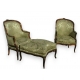 Pair of Louis XV bergeres with one ottoman.