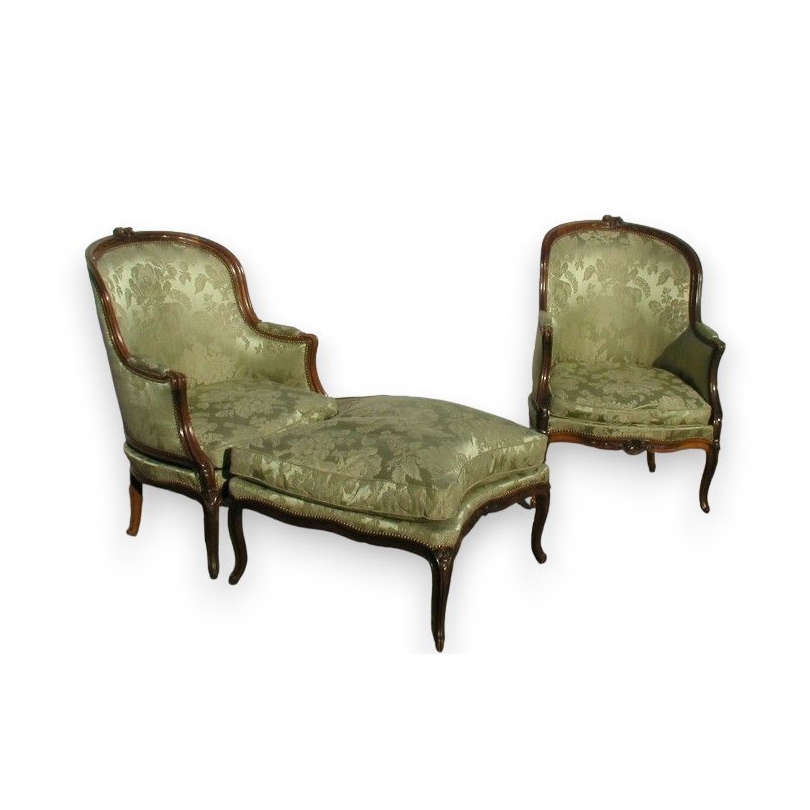 Pair of Louis XV bergeres with one ottoman.