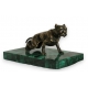 Dog on a malachite base.