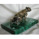 Dog on a malachite base.