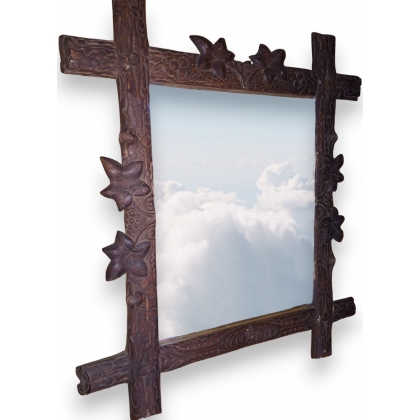 Miroir de Brienz, en bois sculpté.