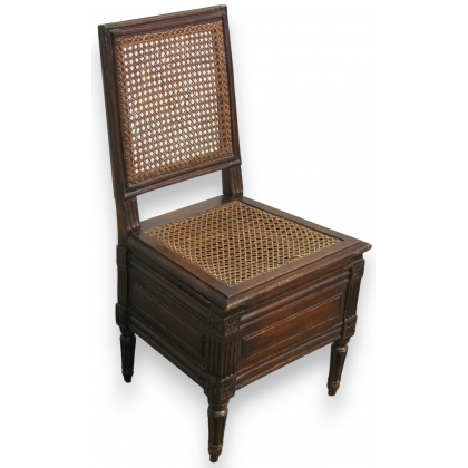 Louis XVI caned toilet chair.